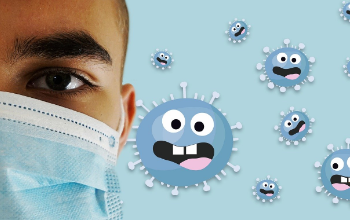 Student wearing mask with cartoon germs in background
